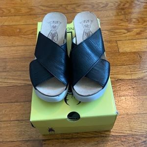 Fly London black slip on wedge sandal